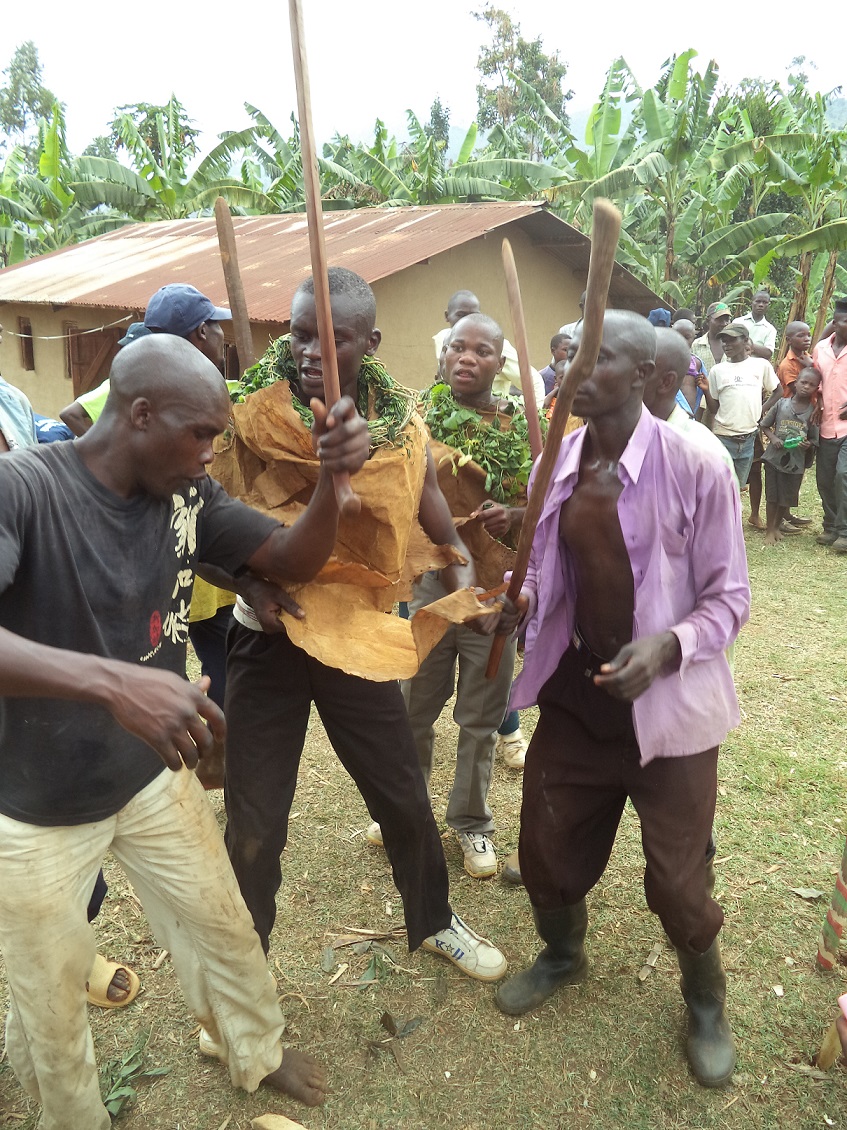 An initiate is taken through the Inemba dance pattern