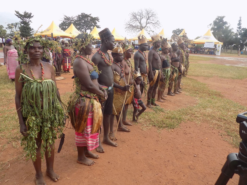 Singers and dancers from the Lucheke clan queue up to showcase antique Gisu traditional wear at the Parade