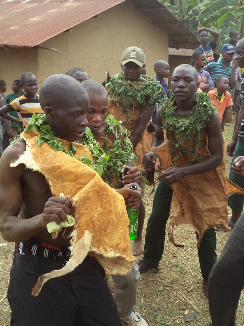 Wakinya dances with other initiates at Bunamasongo