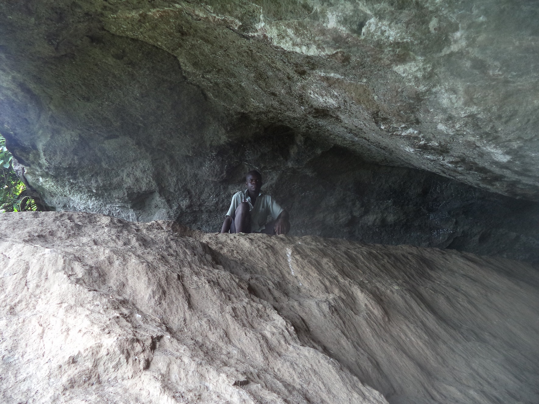 Kutosi my guide inside one of the chambers of the cave.11111